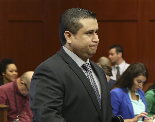 George Zimmerman enters the courtroom for his trial in Seminole circuit court in Sanford, Fla., on Wednesday. Zimmerman has been charged with second-degree murder for the 2012 shooting death of Trayvon Martin.