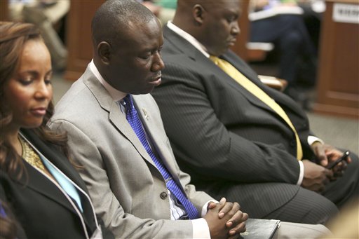 Attorneys Natalie Jackson, Benjamin Crump and Daryl Parks, from left, sit in for the Trayvon Martin family during George Zimmerman's trial in Seminole Circuit Court in Sanford, Fla. today.