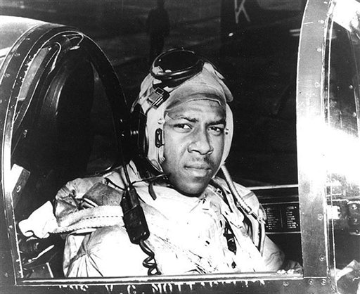 In this undated file photo from around 1950 provided by the U.S. Navy, Ensign Jesse Brown, who died in December 1950 after his plane crashed in North Korea, sits in the cockpit of his plane.