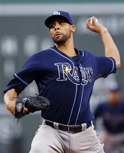 Tampa Bay Rays starting pitcher David Price delivers to the Boston Red Sox during the first inning of a baseball game at Fenway Park in Boston on Wednesday, July 24, 2013. (AP Photo/Elise Amendola)