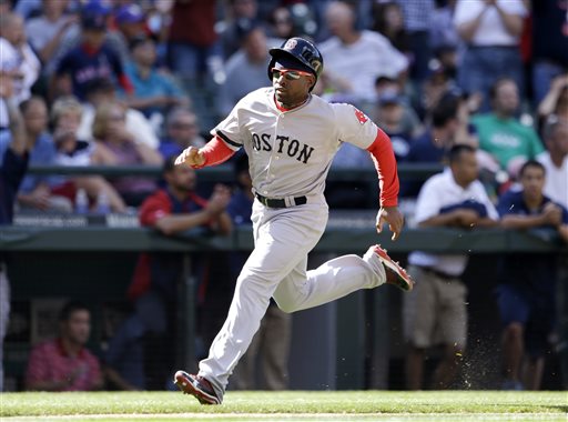 Boston Red Sox's Jackie Bradley Jr. comes around to score against the Seattle Mariners in the 10th inning of the Red Sox' 8-7 win on Thursday in Seattle.