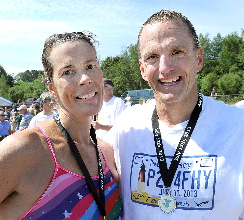 Kirsten Read from Arundel and Scott Yeomans from Bethlehem, Pa. were the first woman and man to finish the 2013 Peaks to Portland on Saturday. Yeomans has won three straight.