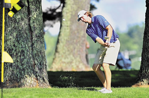 WINNER: Evan Harmeling chips onto a green on the back nine during the Charlie’s Maine Open on Tuesday at Augusta Country Club in Manchester. Harmeling shot a two-day total of 133 to win.
