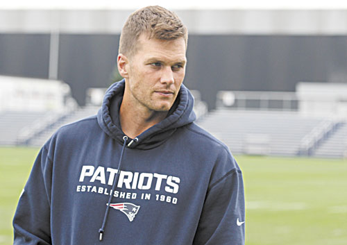 READY TO TALK: New England Patriots quarterback Tom Brady waits to talk with reporters following practice Thursday in Foxborough, Mass. Brady and the Patriots four other captains addressed their upcoming season and offseason troubles.