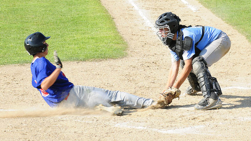 MOVING ON: Augusta’s Michael Levesque is out at home as Central Maine catcher Colby Dexter applies the tag during a 13-year-old Babe Ruth state playoff game last week at McGuire Field in Augusta. Central Maine won 9-7 and went on to win the state title. The team will play Western Massachusetts on Friday in the New England regional tournament in Manchester, N.H.