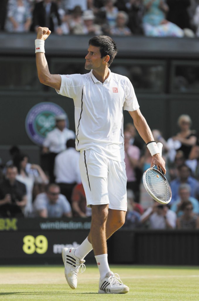 TO THE FINAL: Novak Djokovic celebrates as he wins against Juan Martin Del Potro in their semifinal match Friday at the All England Lawn Tennis Championships in Wimbledon, London.