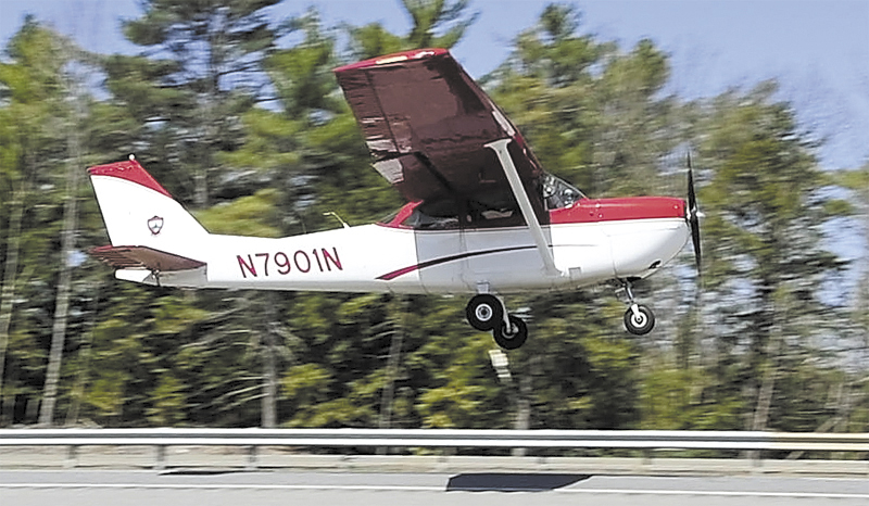 A Warden Service plane takes off from Interstate 95 in Litchfield on April 26.