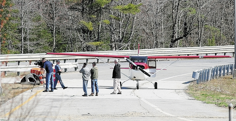 A Warden Service plane is parked on a ramp of a former highway rest stop on April 26 along Interstate 95 in Litchfield.