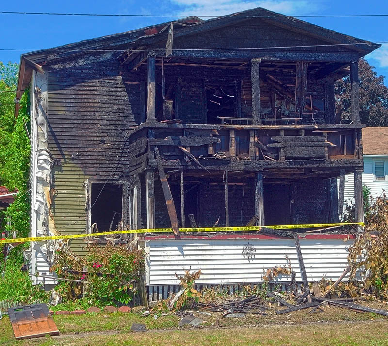 This photo taken on Friday, shows damage done by an fire the night before to a six-unit apartment building at 62 Washington Street in Augusta.