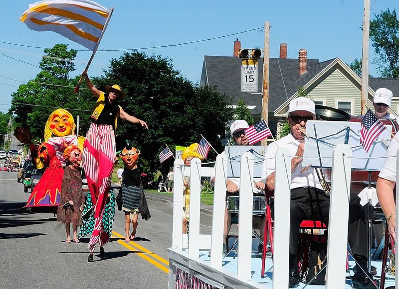The Shoestring Theater dances to the music played by the Hallowell Community Band during the Old RIchmond Days parade on today in Richmond. In addition to the parade, today's events included a 5-kilometer race, lobster crate races, musical performances, a show by TIm Sample and fireworks.