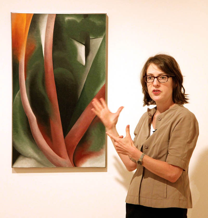 Colby College Museum of Art Director and Chief Curator Sharon Corwin talks about a painting by Georgia O'Keefe, titled "Birch and Pine Trees-Pink," during a tour for members of the media of the Lunder Collection on Tuesday in Waterville. Corwin said the piece is one of the great works of the Lunder Collection.