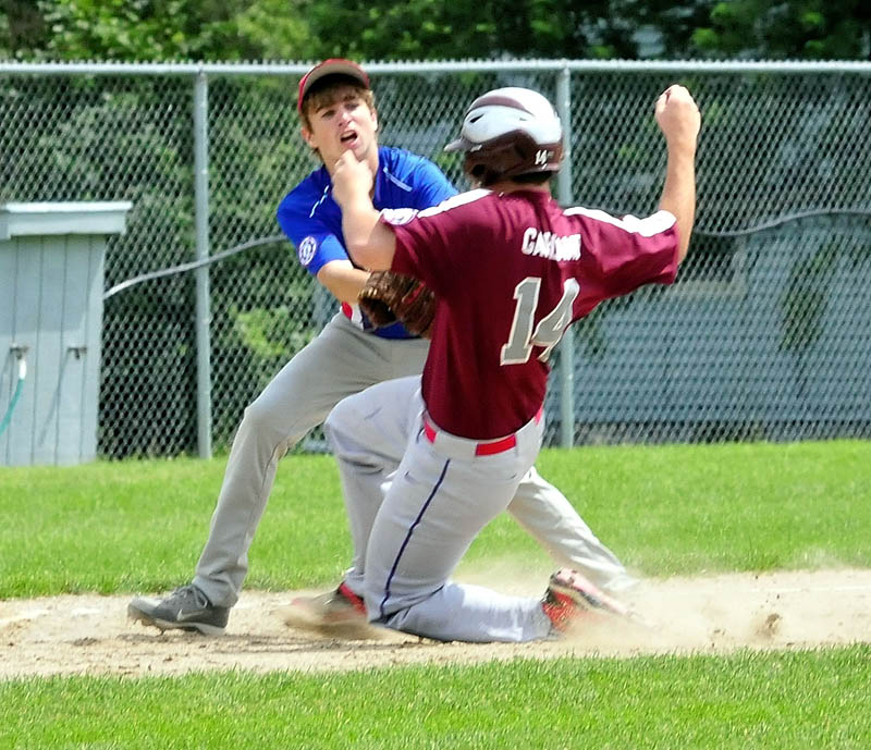 MAKE THE TAG: Augusta’s Dameron Rodrigue tags out Central Maine runner Connor Garland at third base during a 14-year-old Babe Ruth All-Star state tournament game Sunday in Fairfield. Central Maine won 5-2 to win the state championship.