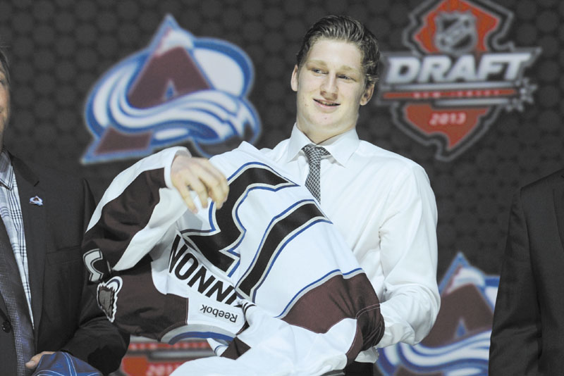 COLORADO’S NEW STAR: Nathan MacKinnon grew up in the same hometown as Sidney Crosby and grew up idolizing the Penguins star. Now, like his boyhood hero, MacKinnon is a No. 1 pick in the NHL draft.