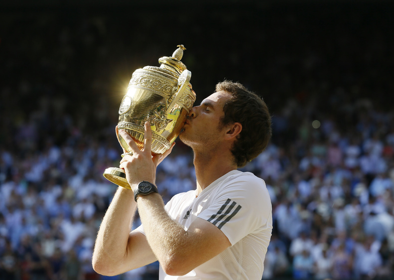 Andy Murray of Britain with the Wimbledon trophy he coveted for so long.