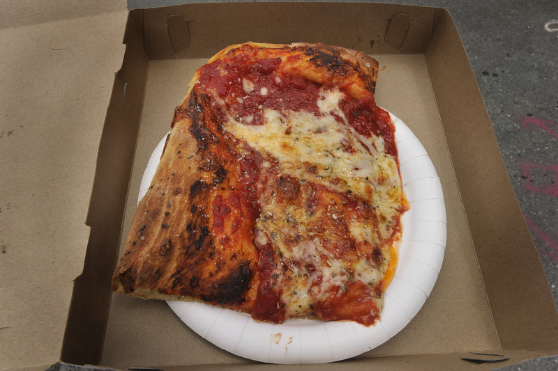 Micucci's Grocery on India Street in Portland is well known for the Sicilian Slab pizza developed by fired baker Stephen Lanzalotta.