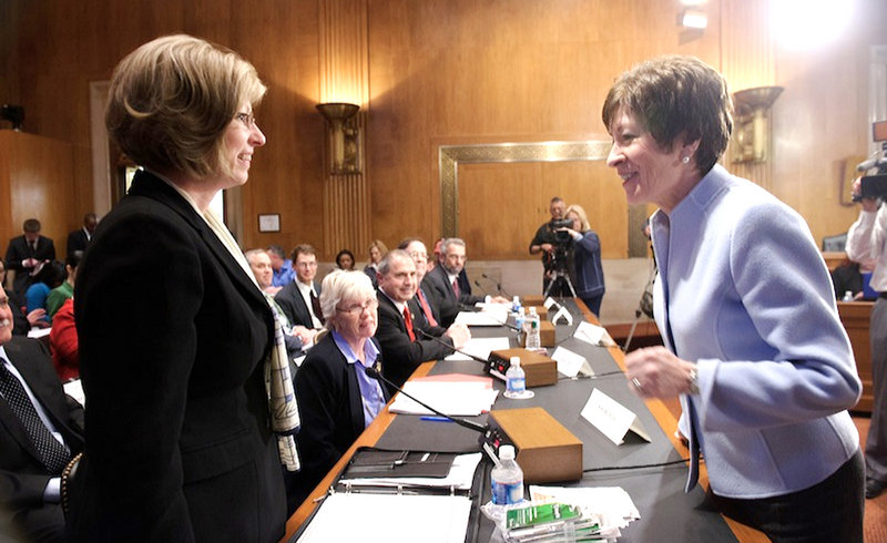 Sen. Susan Collins, R-Maine, talks with Hermon resident Kim Nichols, left, before a March hearing of the Senate Special Committee on Aging about lottery scams targeting senior citizens. Nichols’ father, who lives in New Hampshire, lost $85,000 to the Jamaica-based scammers.
