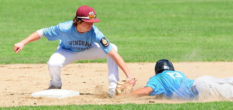 Windham second baseman Tanner Laberge tags out Madison baserunner Derek Leblanc during an American Legion tournament game on Saturday at Morton Field in Augusta.