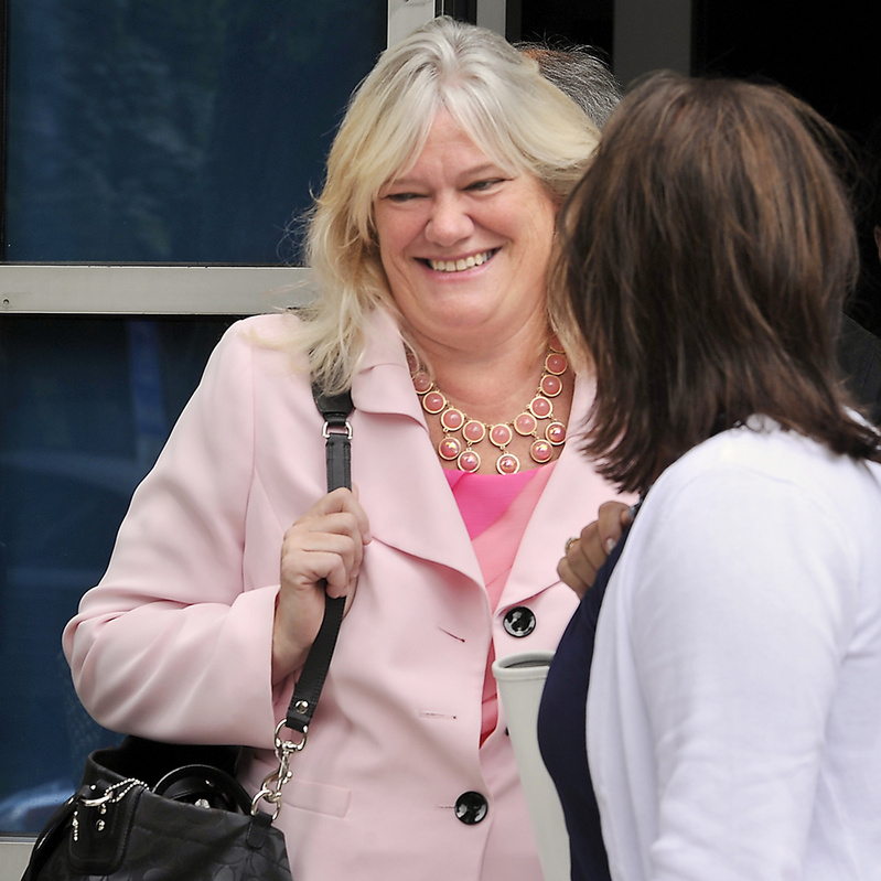 Suzanne Joyce leaves the Cumberland County Courthouse in Portland on Thursday, where her attorney and a prosecutor met with a judge.