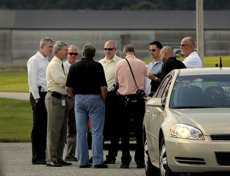State police investigators and Deputy Attorney General William Stokes met with officials from Moark Egg Farm at its Turner location Tuesday, August 20, 2013, after a man was accidentally shot and killed by a co-worker who was shooting rodents and stray chickens.
