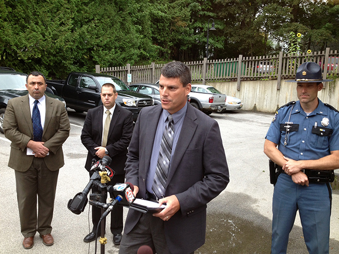 Belfast Police Chief Michael McFadden, left, Maine State Police Sgt. Jason Richards; State Police Lt. Christopher Coleman, speaking; and State Police Lt. Aaron Hayden speak to the press Thursday following the shooting that left one woman dead and her son critically injured. Police have arrested the suspect, Todd Gilday, 44, of Belfast.