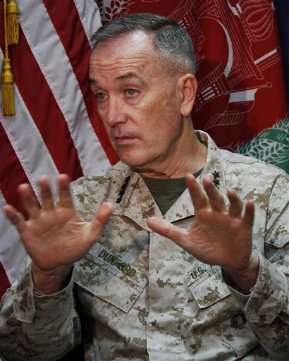 Marine Gen. Joseph Dunford, who commands the U.S.-led International Security Assistance Force, speaks during an interview with The Associated Press at the ISAF headquarters in Kabul, Afghanistan, today. The top U.S. and coalition commander in Afghanistan said the signing of a bilateral security agreement between America and Afghanistan will send a clear signal both to the Afghan people and the Taliban that the international community is committed to the future stability of the country even as foreign forces withdraw.
