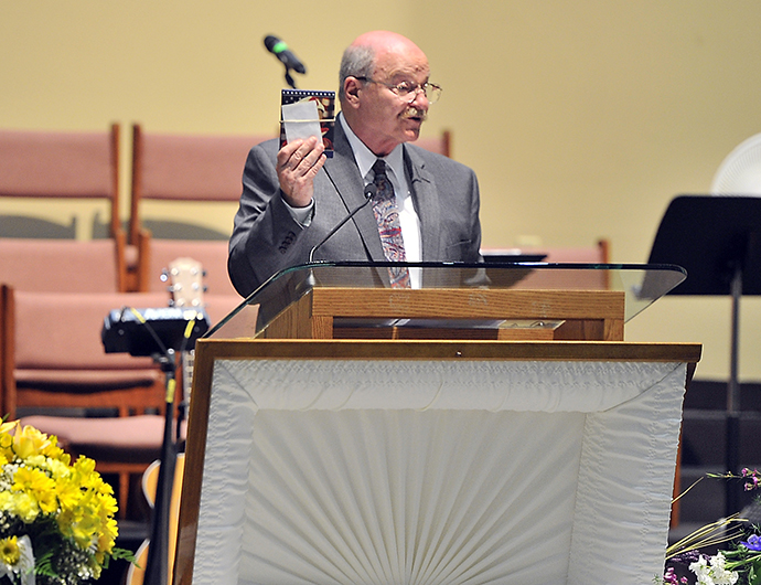 Ashley Drew's father speaks at A Celebration of Life for his daughter at First Baptist Church in Portland on Friday.