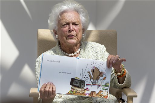 Former first lady Barbara Bush reads "The Best Mouse Cookie" by Laura Numeroff on Thursday at The Barbara Bush Children's Hospital at Maine Medical Center in Portland.