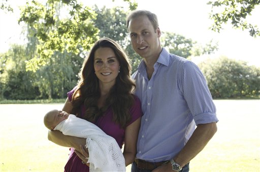 Another image taken by Michael Middleton, the Duchess's father, showing the Duke and Duchess of Cambridge with Prince George, in the garden of the Middleton family home in Bucklebury, England.