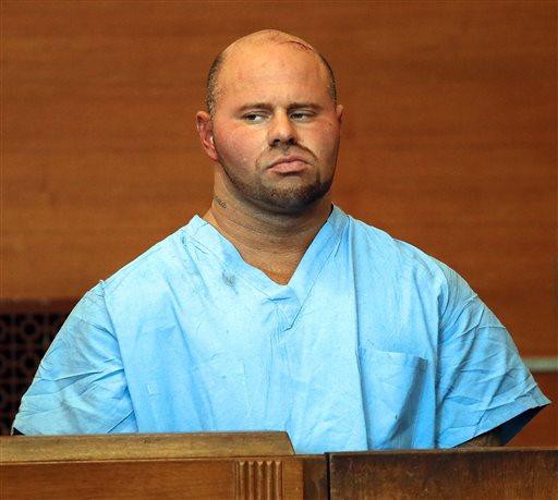 Jared Remy appears at Waltham District Court for his arraignment in this Aug. 16, 2013, photo, in Waltham, Mass. Remy, the son of longtime Boston Red Sox broadcaster Jerry Remy, is being held without bail after pleading not guilty to a charge of murder.
