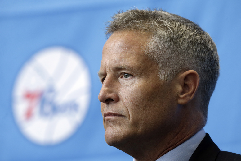 Philadelphia 76ers incoming head coach Brett Brown listens during a news conference introducing him as head coach Wednesday in Philadelphia. Brown's hire ended a four-month search to replace Doug Collins.