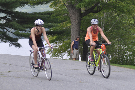 Minna Mathiasson, 22, of Cannan and Meg Hatch, 35, of Waterville in training at Lake George, In Skowhegan, for the Sept. 15 Sprint Triathlon.
