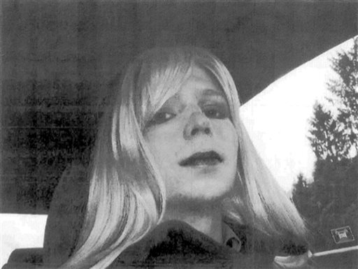 In this undated file photo provided by the U.S. Army, Pfc. Bradley Manning poses for a photo wearing a wig and lipstick.