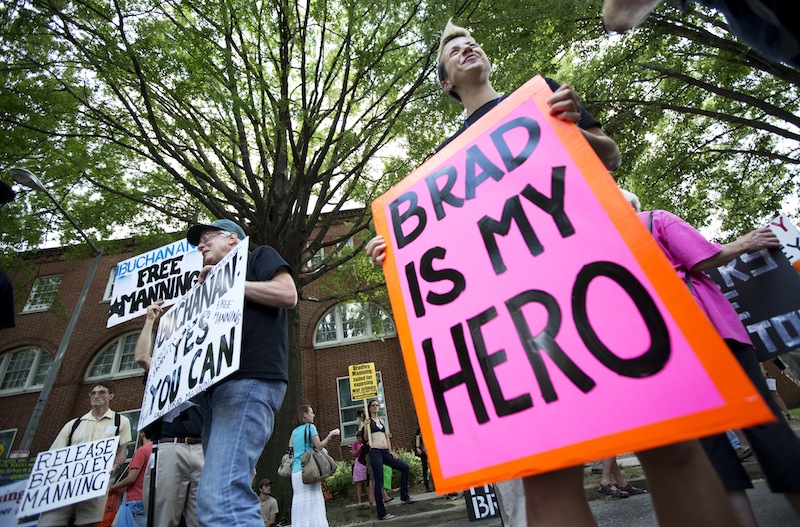 Heike Schotten of Cambridge, Mass., right, joins supporters of U.S. Army Pfc. Bradley Manning at a rally last month outside Fort Lesley J. McNair in Washington, D.C. On Wednesday, Manning was sentenced to 35 years in prison for leaking classified information.