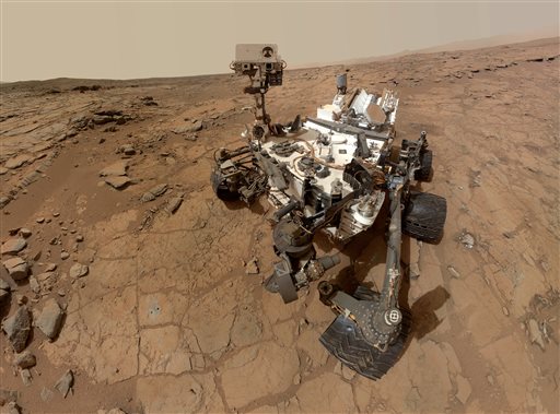 This photo released by NASA shows a self-portrait taken by the rover Curiosity in Gale Crater on Mars. Measurements of the Martian air by the rover have found that it's mostly made of carbon dioxide with traces of other gases.