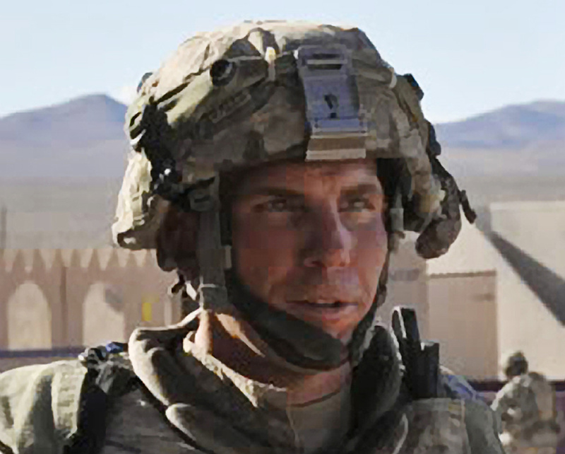 In this Aug. 23, 2011, photo, Staff Sgt. Robert Bales participates in an exercise at the National Training Center at Fort Irwin, Calif.