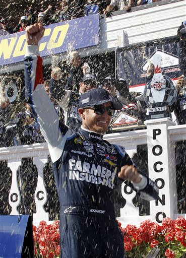 Kasey Kahne celebrates in victory lane after winning a NASCAR Sprint Cup Series auto race Sunday at Pocono Raceway in Long Pond, Pa. Jeff Gordon was second.