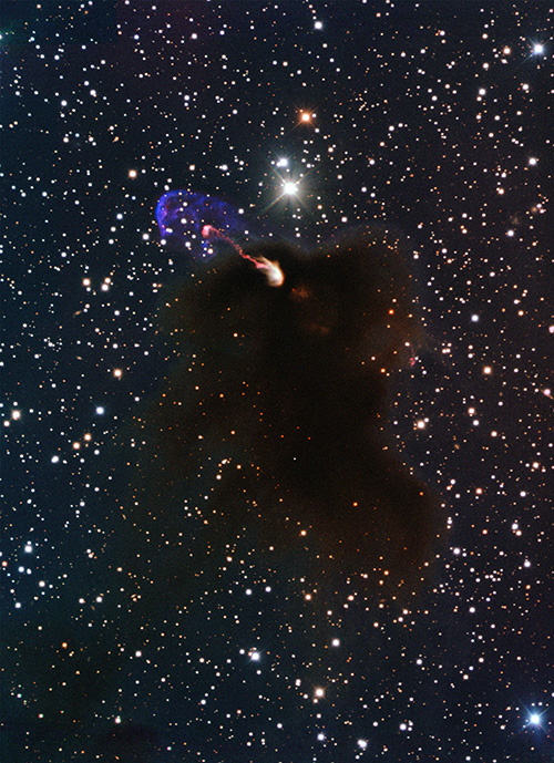 This image made available by the European Southern Observatory shows the Herbig-Haro object HH 46/47 as jets emerge from a star-forming dark cloud. Astronomers say these illuminated jets are spewing out faster than ever measured before and are more energetic than previously thought.