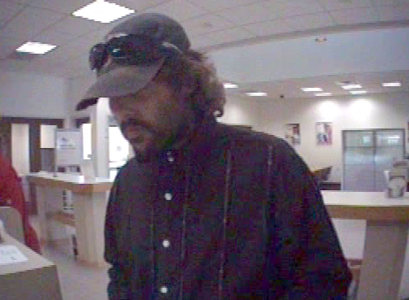 This surveillance photo shows a man who walked into the Newport Key Bank branch on Thursday afternoon and demanded money.