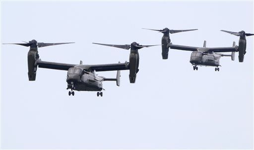Two MV-22 "Osprey" aircraft approach an airfield in Edgartown, Mass. on the island of Martha's Vineyard while flying in support of the Marine One helicopter carrying President Obama on Saturday.