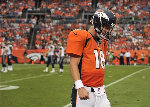 Though his team is struggling on and off the field, Denver Broncos quarterback Peyton Manning is still looking forward to the news season.