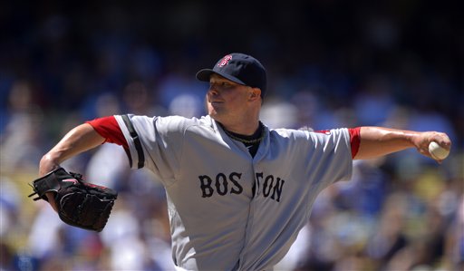 WELL DONE: Boston Red Sox starting pitcher Jon Lester pitched 7 1/3 innings, allowed one run, struck out six, walked four and gave up three hits Saturday against the Los Angeles Dodgers on Saturday in Los Angeles.