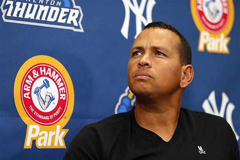 New York Yankees third baseman Alex Rodriguez answers questions during a news conference after a minor league baseball rehab start with the Trenton Thunder on Saturday. Rodriguez all but said he thought Major League Baseball and the Yankees were conspiring to keep him from getting back to the big leagues. He is expected to be suspended Monday but can play while he appeals the penalty.