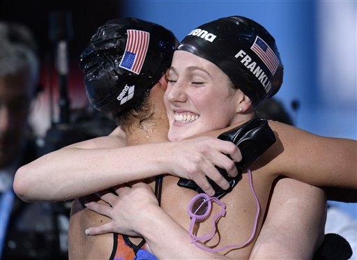 United States Women's 4x100m medley relay team members Missy Franklin, right, and Megan Romano embrace after winning the gold medal at the FINA Swimming World Championships in Barcelona on Sunday.