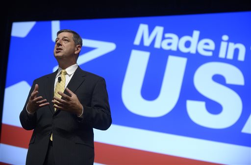 Wal-Mart U.S. President and CEO Bill Simon addresses attendees of the Wal-Mart U.S. Manufacturing Summit in Orlando, Fla., Thursday.