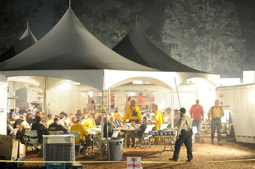 Firefighters are fed in tents set up at the Rim Fire incident command post 7 miles east of Groveland, after a hard day of fighting the fire.