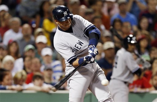 New York Yankees' Alex Rodriguez hits a single in the seventh inning of a game against the Boston Red Sox Sunday in Boston.