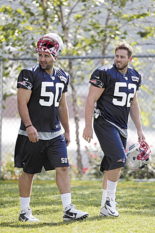BACK AT IT: New England Patriots linebacker Dane Fletcher (52) spent all last season on injured reserve. Now he’s healthy and having a strong training camp.