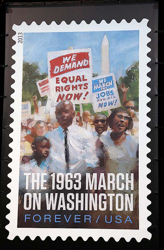 A photo of the limited edition U.S. Postal Service stamp commemorating the 50th anniversary of the March on Washington is seen after it was unveiled at an event at the Newseum in Washington on Friday.