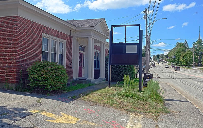 This photo taken Aug. 14 shows the former bank building at 22 Western Ave. in Augusta, that is the proposed site for a Dunkin Donuts in Augusta. A drive-through location nearby, on Sewall Street, would close if the development is approved.