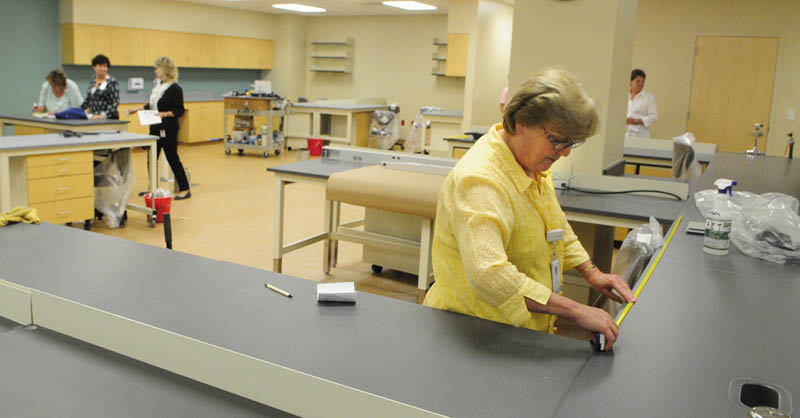Jessie Mackenzie, a clinical supervisor, checks out her space in the hematology section of the pathology lab on Wednesday at the new Alfond Center for Health regional hospital in Augusta.